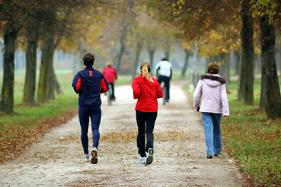 People jogging in autumn